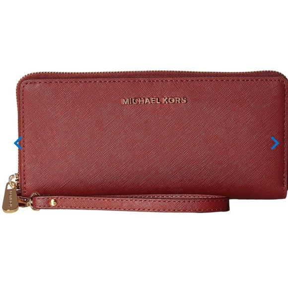Michael Kors Handbags - NWB Michael Kors Travel Wallet in Brick
